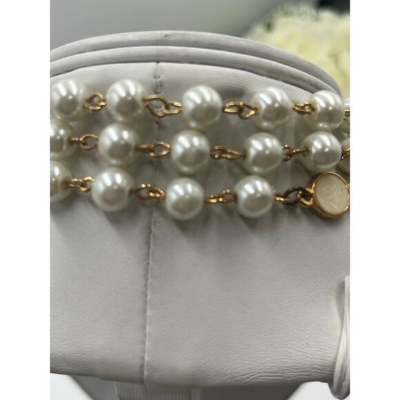 Tory Burch Authentic Long
Pearl Logo Medallion
Multi-Strand Gold 60" Necklace - Picture 8 of 15